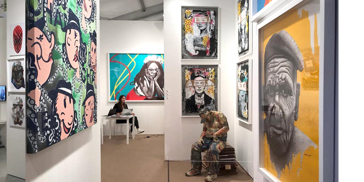 BNS paintings displayed in a gallery exhibition