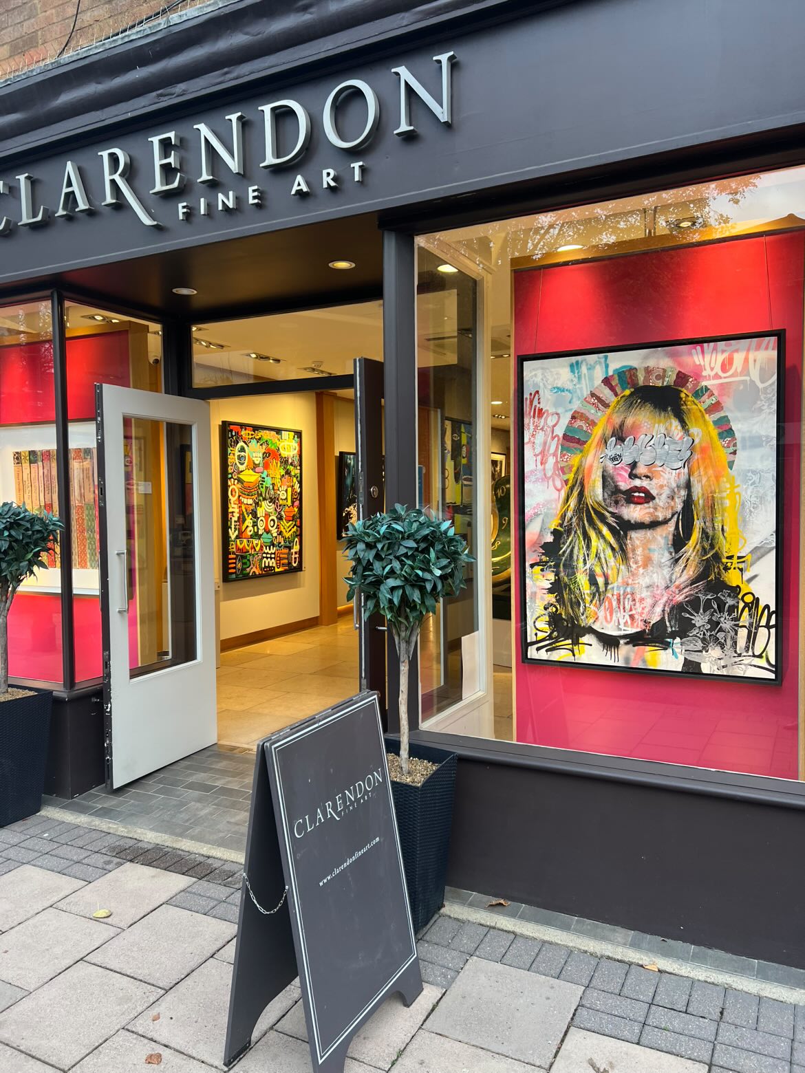 BNS portrait artwork in the window of Clarendon Fine Art